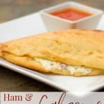 These Ham & Cheese Calzones made with diced ham, ricotta and mozzarella cheeses; then stuffed inside pizza dough are delicious and so easy to make at home. 