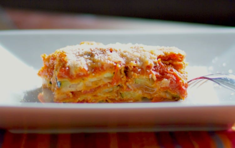 A close up of a slice of Zucchini parmesan