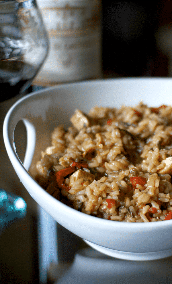 A bowl of balsamic risotto with grilled chicken