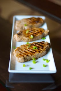 A tray of Lemon Ginger Grilled Pork Chops