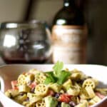 Pasta salad with fresh avocado, black beans and tomatoes in a Goat cheese, lime vinaigrette is delicious and super flavorful. 