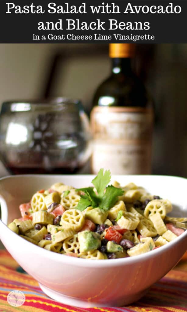 Pasta salad with fresh avocado, black beans and tomatoes in a Goat cheese, lime vinaigrette is delicious and super flavorful. 