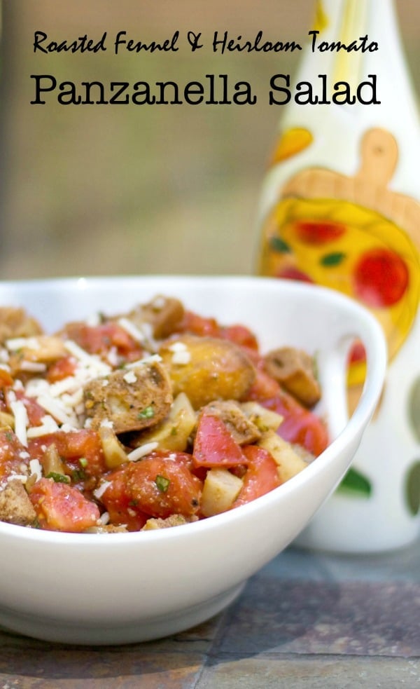 A close up of a bowl of fennel and tomato panzanella salad