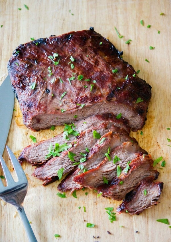 Flank steak marinated in fresh ginger, ginger, soy sauce, and brown sugar; then grilled to perfection. A must-try on your summer grilling list.