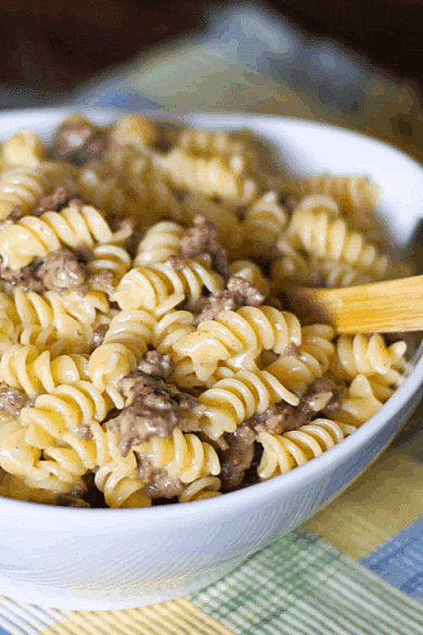 a white dish with cheeseburger macaroni