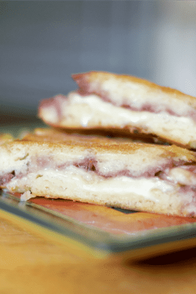 This panini made with creamy Brie cheese and sweet seedless raspberry jam makes a tasty lunch or quick dinner sandwich.