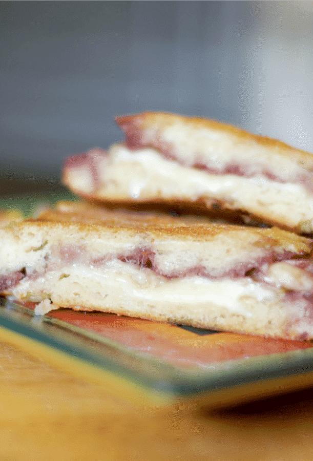 This panini made with creamy Brie cheese and sweet seedless raspberry jam makes a tasty lunch or quick dinner sandwich.