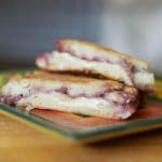 Brie and Raspberry Jam Panini on a plate