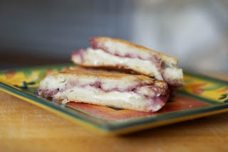 Brie and Raspberry Jam Panini on a plate