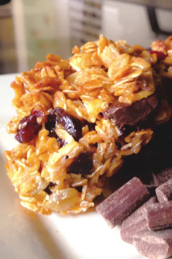 A close up of a plate of food, with Chocolate and Cherry