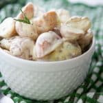 Dijon Red Bliss Potato Salad in white serving bowl