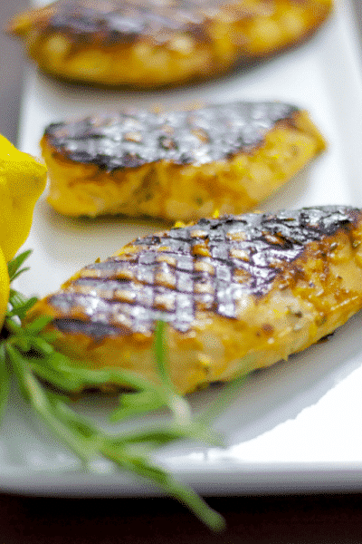 Boneless chicken breasts marinated in a combination of honey, lemon juice and rosemary; then grilled