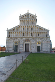 A large lawn in front of a building