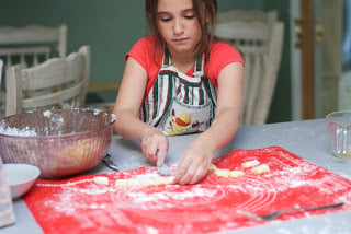 Gabby forking the homemade gnocchi