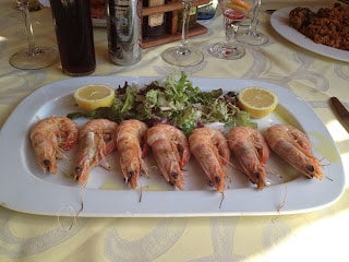 A plate of food on a table, with Seafood