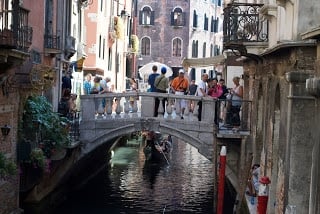 River in Venice with a bridge. 