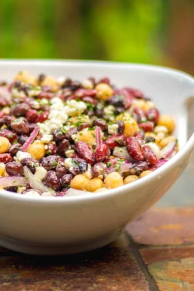 Kidney, black and garbanzo beans tossed with Feta cheese and a light, lemony Dijon vinaigrette make up this tasty Three Bean Salad with Feta. 