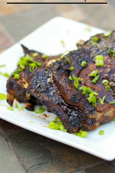 Pork spareribs slowly simmered until they're fall-off-the-bone tender; then brushed with an Asian Marinade and grilled to perfection.