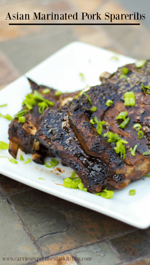 Pork spareribs slowly simmered until they're fall-off-the-bone tender; then brushed with an Asian Marinade and grilled to perfection. 