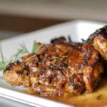 Chicken Balsamico made with bone-in chicken thighs cooked in a balsamic white wine sauce with fresh chopped rosemary.