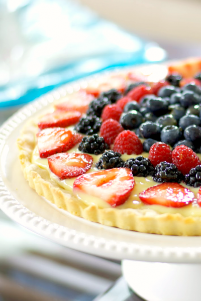 This Fresh Berry Tart made with vanilla pudding and fresh berries on a cookie crust is deliciously cool, refreshing and so easy to make.