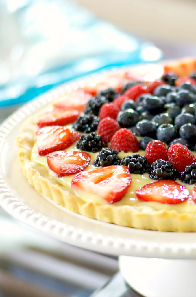 This Fresh Berry Tart made with vanilla pudding and fresh berries on a cookie crust is deliciously cool, refreshing and so easy to make.