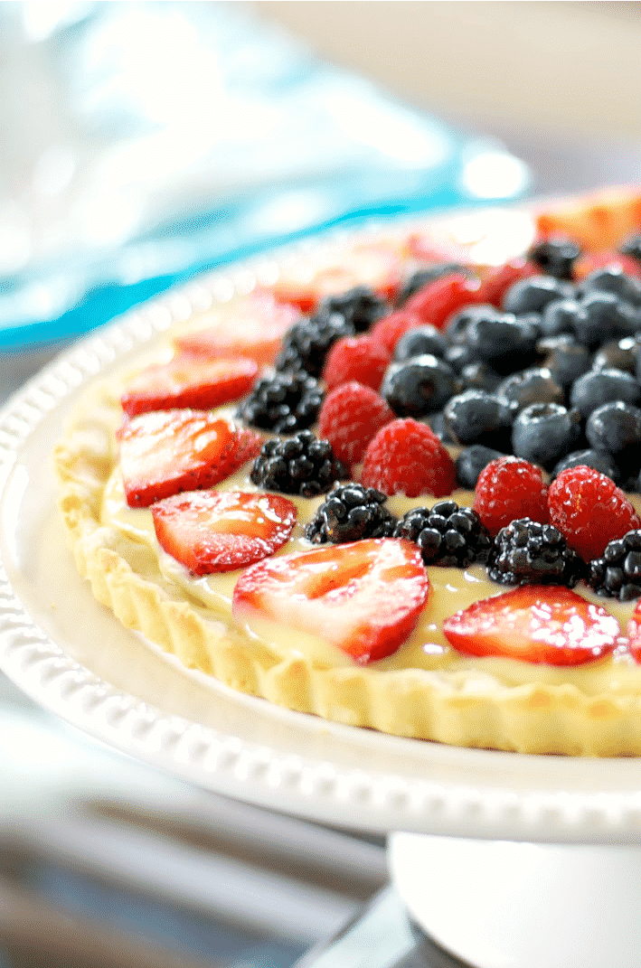 This Fresh Berry Tart made with vanilla pudding and fresh berries on a cookie crust is deliciously cool, refreshing and so easy to make.