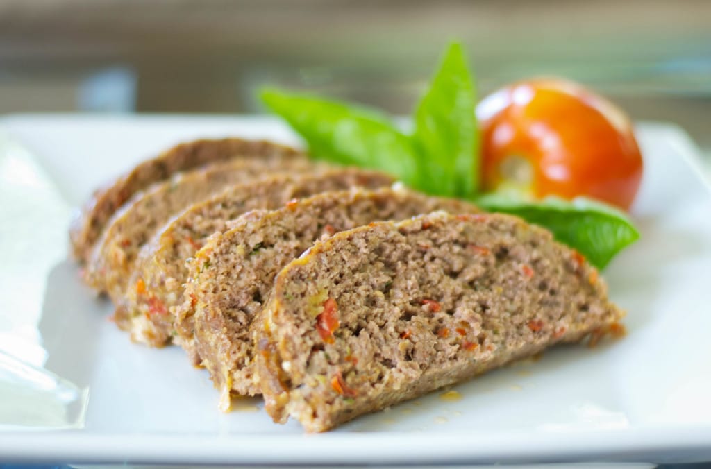 Italian Meatloaf made with lean ground beef, basil, garlic, tomatoes, Pecorino Romano grated cheese and Italian breadcrumbs. 