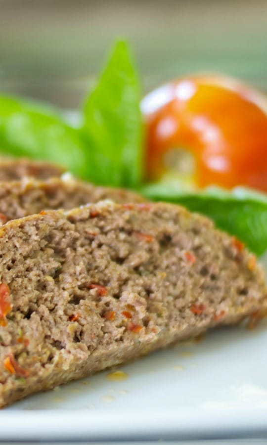 Italian Meatloaf made with lean ground beef, basil, garlic, tomatoes, Pecorino Romano grated cheese and Italian breadcrumbs.