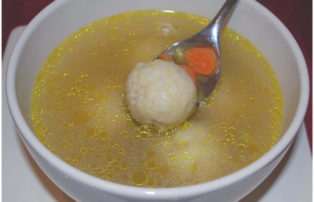Italian Matzo Ball Soup is a chicken broth based soup with matzo balls made with fresh rosemary and grated Pecorino Romano cheese. 