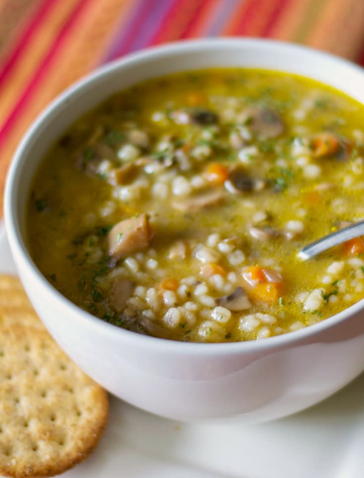 This vegetarian Mushroom Barley Soup made with white mushrooms, vegetables, and vegetable broth is so hearty, you can eat it as a meal.
