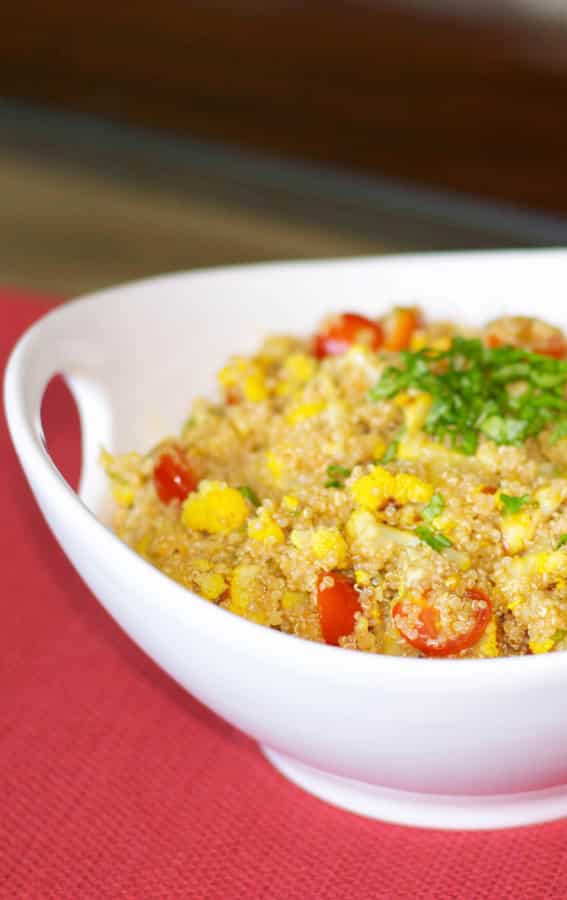 Quinoa salad made with roasted cauliflower, garlic, and saffron in a light balsamic vinaigrette is deliciously light and flavorful. 