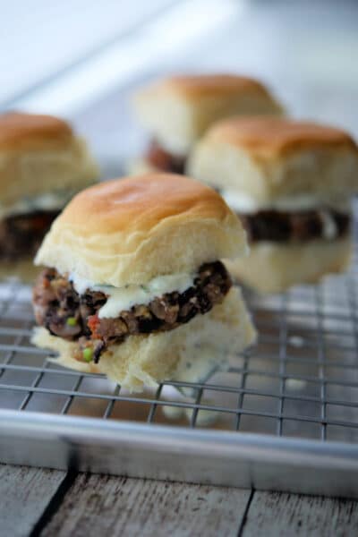greek black bean sliders on a tray