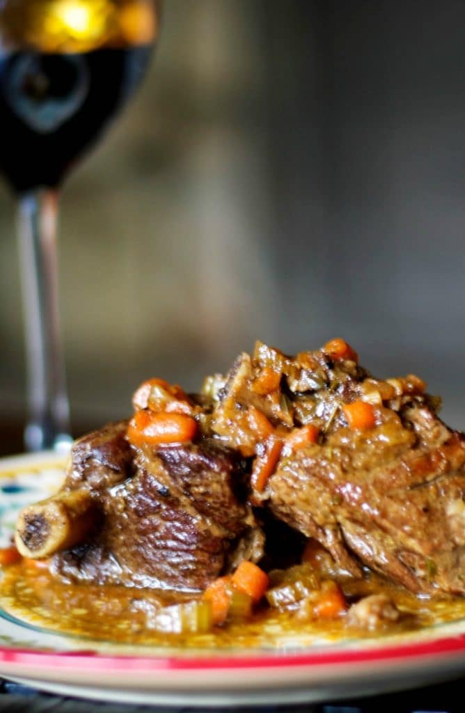 A close up of a plate of food, with Short ribs and Beef