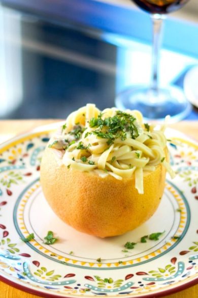 Fettuccine pasta tossed with mushrooms in a light pink grapefruit and fresh mint sauce is deliciously light and flavorful. 