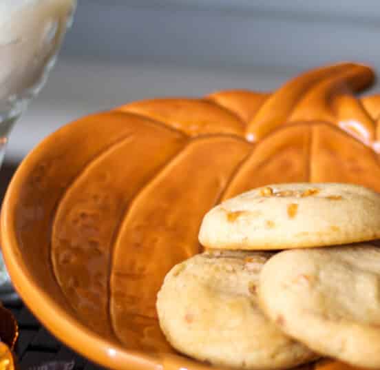 Pumpkin Spice Hershey's Kisses combined with my favorite soft and moist sugar cookie recipe. A tasty Fall treat the kids will love.
