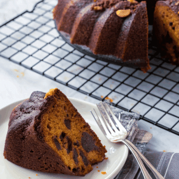 a close of up a slice of chocolate pumpkin banana bread on a plate