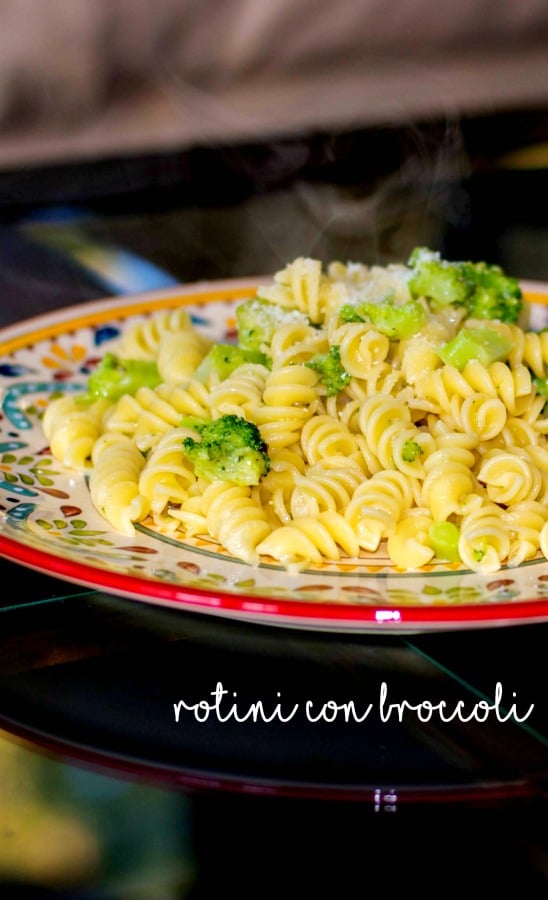 Rotini con Broccoli is a simple weeknight meal made with rotini pasta, broccoli florets, garlic, and grated Pecorino Romano cheese. 