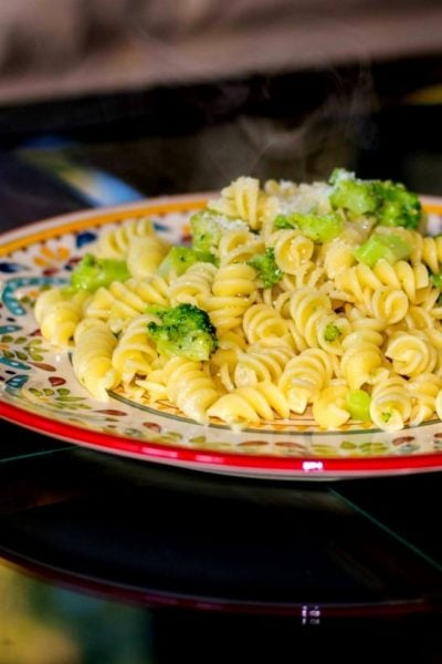 Rotini con Broccoli is a simple weeknight meal made with rotini pasta, broccoli florets, garlic, and grated Pecorino Romano cheese. 