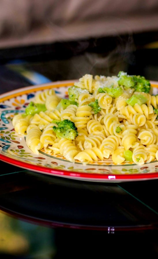 Rotini con Broccoli is a simple weeknight meal made with rotini pasta, broccoli florets, garlic, and grated Pecorino Romano cheese. 