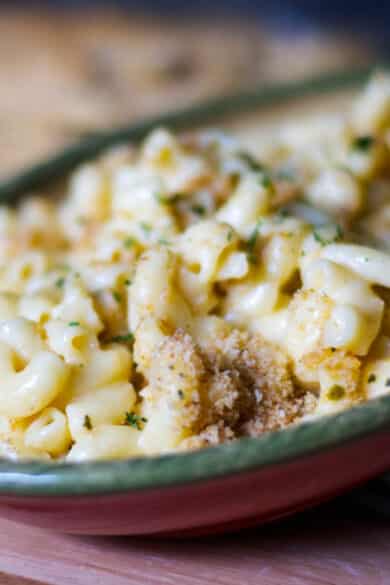 This Three Cheese Mac & Cheese is so creamy. It's made with Velveeta, Asiago and Pecorino Romano cheeses; then baked until hot and bubbly.