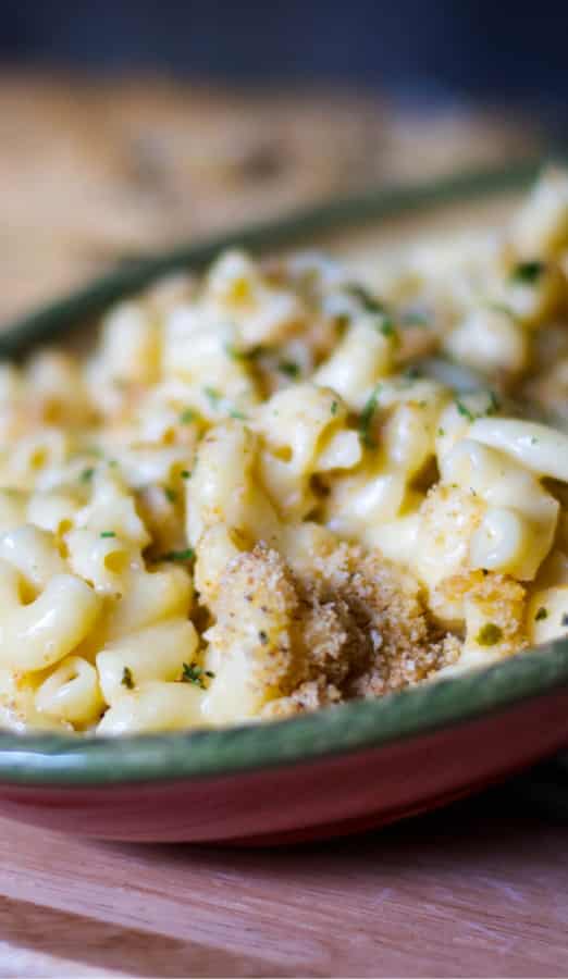 This Three Cheese Mac & Cheese is so creamy. It's made with Velveeta, Asiago and Pecorino Romano cheeses; then baked until hot and bubbly.