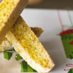 A close up of Anise Biscotti on a Christmas plate.