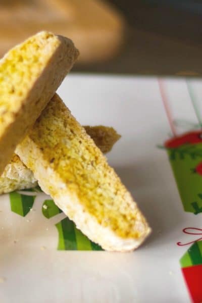 A close up of Anise Biscotti on a Christmas plate.