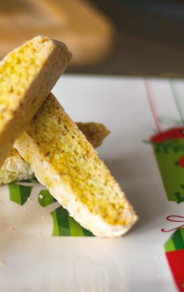 A close up of Anise Biscotti on a Christmas plate. 