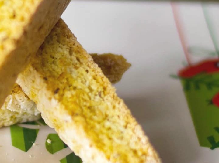 A close up of Anise Biscotti on a Christmas plate.