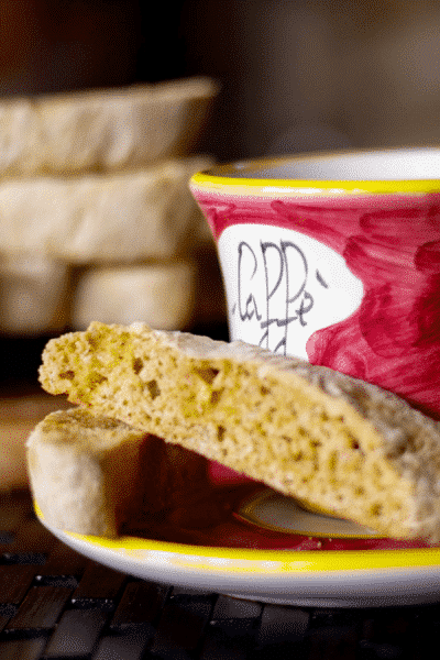 Cappuccino White Chocolate Biscotti on a plate with coffee.