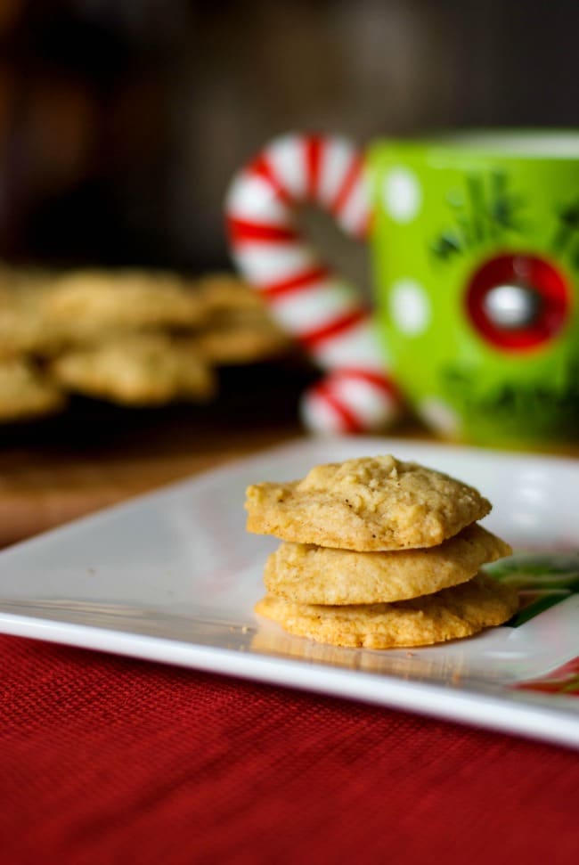 A close up of eggnog cookies on a plate. 