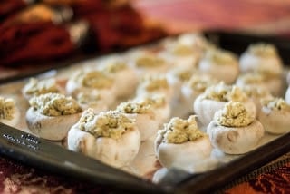 A close up of food, with Stuffed mushrooms