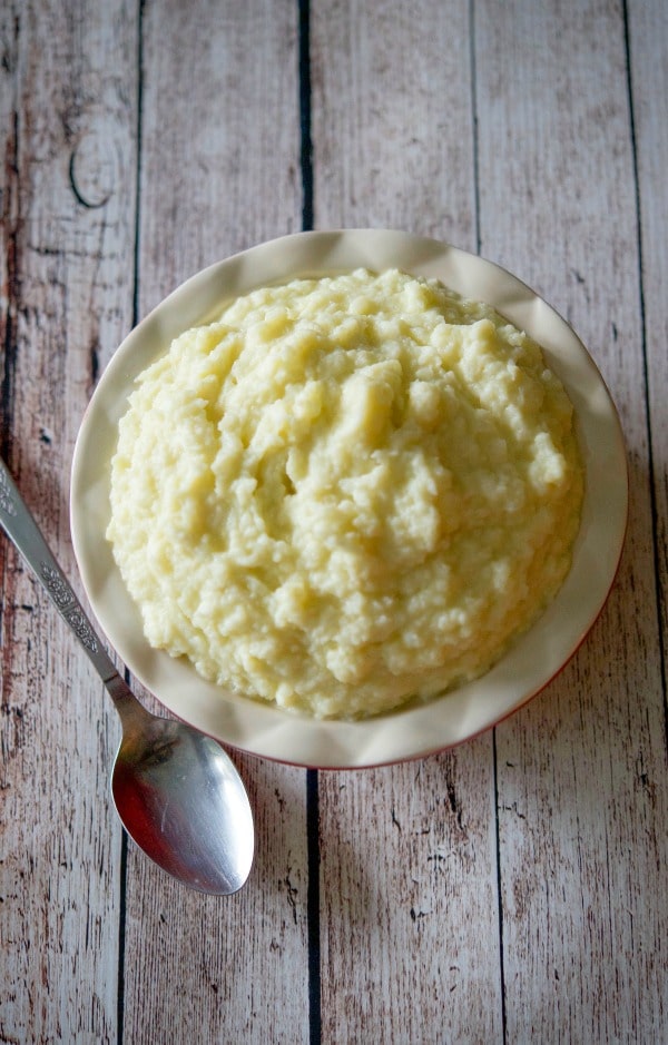 Roasted Garlic Mashed Cauliflower is a healthier alternative to mashed potatoes, without lacking the creaminess and flavor. 